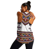 Women’s racerback tank in white with colorful zigzag print, back view