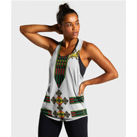 White racerback tank with Ethiopian lion print and green/red/yellow pattern