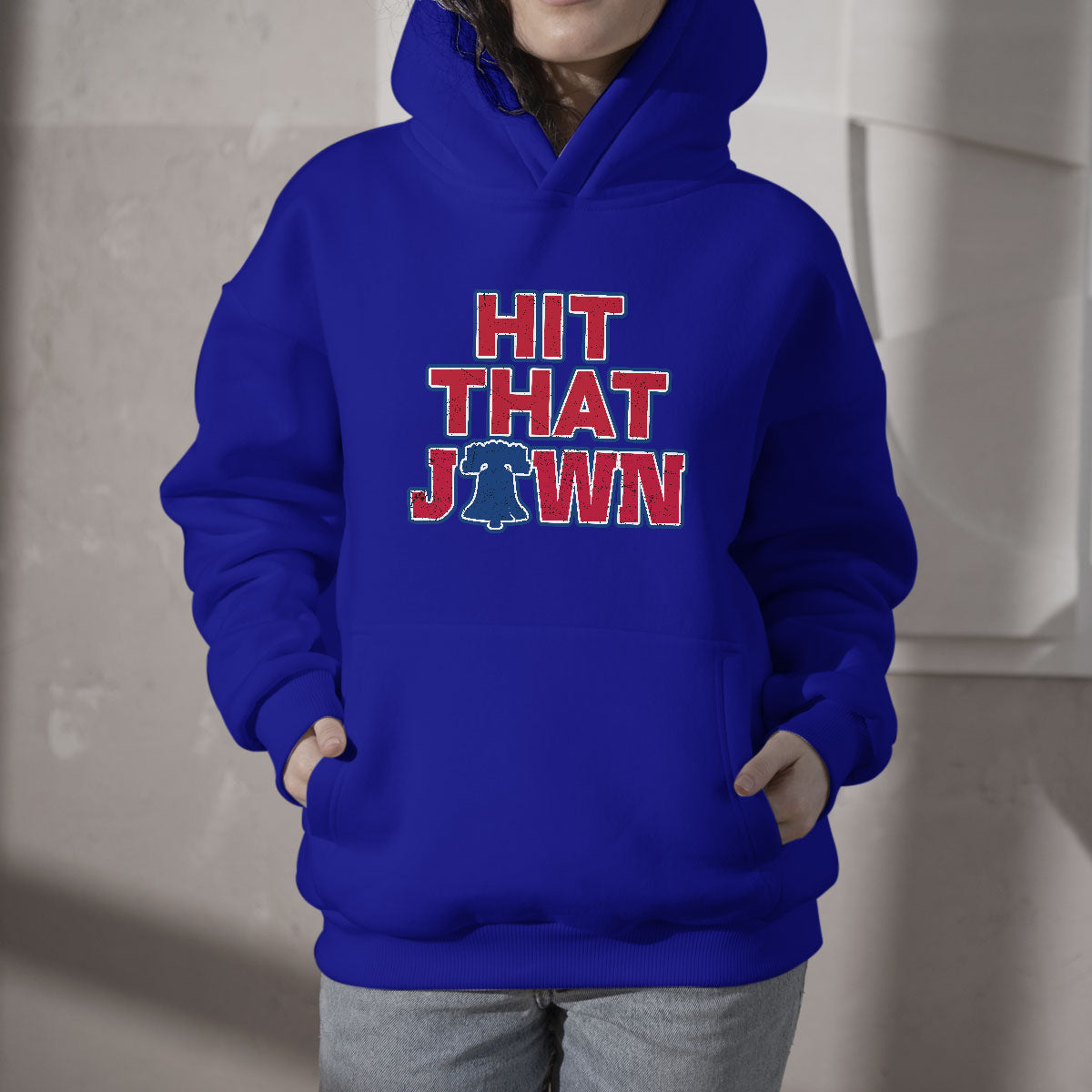 Blue hooded sweatshirt with front pocket and 'HIT THAT JAWN' graphic