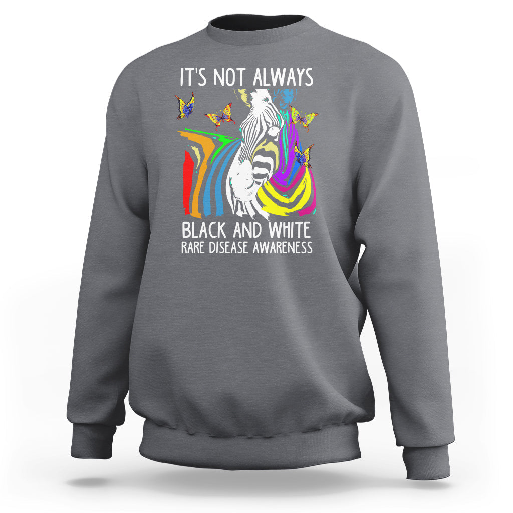 Kids charcoal gray crewneck sweatshirt with zebra and rainbow awareness graphic on front.
