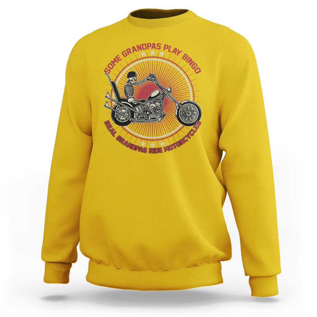 Yellow crewneck sweatshirt with biker graphic and round text on back
