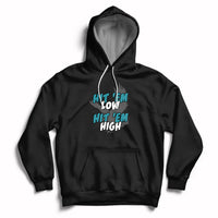 Black pullover groovy hoodie with front graphic "Hit 'Em Low, Hit 'Em High"