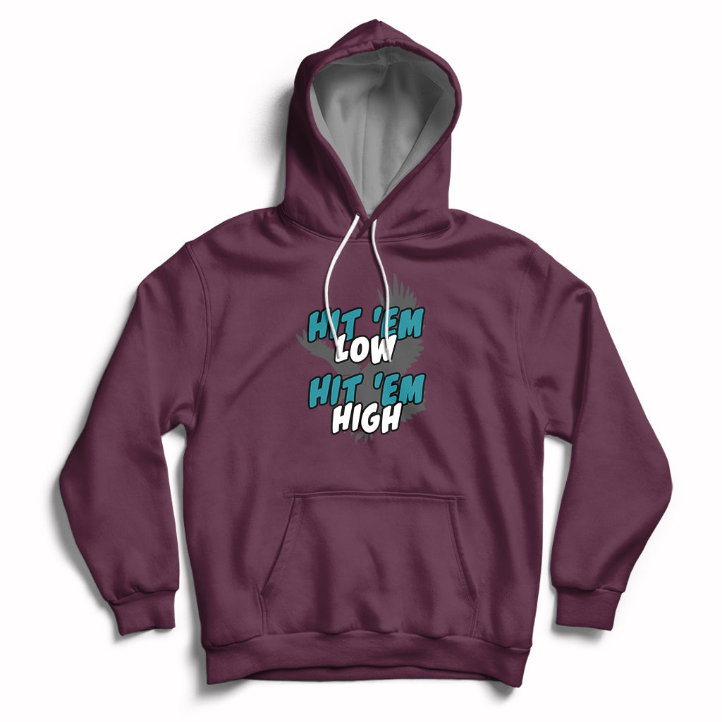 Purple pullover groovy hoodie with front graphic "Hit 'Em Low, Hit 'Em High"