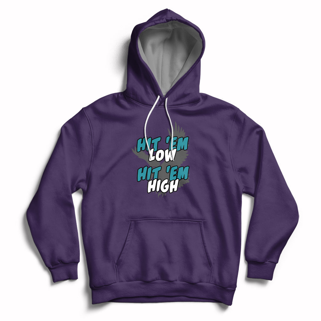 Purple pullover hoodie with front pocket; 'Hit 'Em Low Hit 'Em High' chest graphic