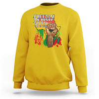 Daisy yellow crewneck sweatshirt with colorful freedom graphic on the chest