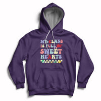 Purple pullover hoodie with colorful Valentine heart text graphic, kangaroo pocket