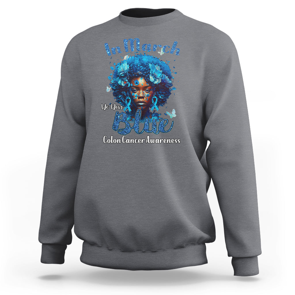 Charcoal gray crewneck sweatshirt with blue colon cancer ribbon portrait graphic on front