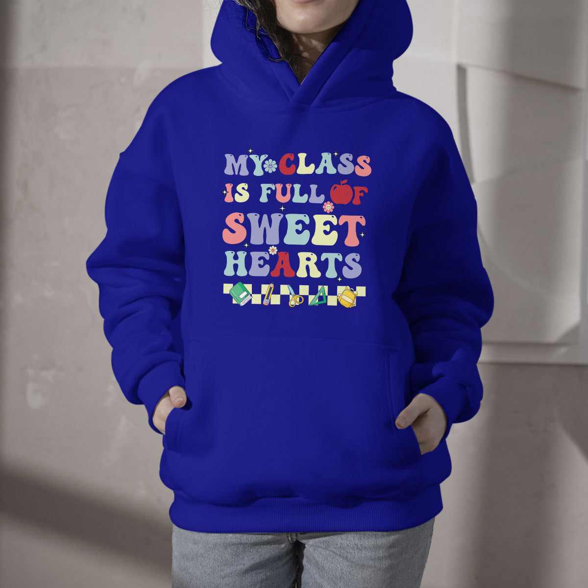 Royal blue teacher hoodie with colorful 'Sweet Hearts' chest graphic, hood & front pocket
