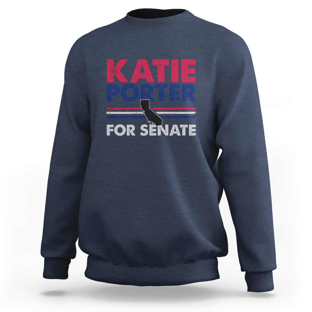 Navy crewneck sweatshirt with front graphic text: KATIE PORTER FOR SENATE