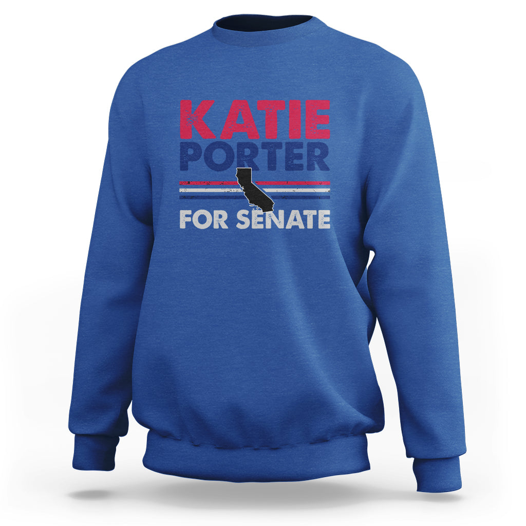 Royal blue crewneck sweatshirt with front graphic text: KATIE PORTER FOR SENATE