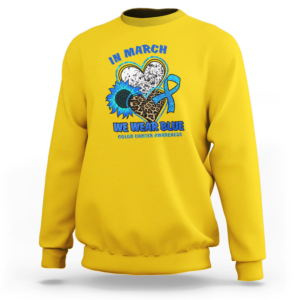 In March We Wear Blue For Colon Cancer Awareness CRC Blue Ribbon Blue Heart Sweatshirt - Wonder Print Shop