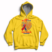 Yellow pullover hoodie with hood and kangaroo pocket; red/blue heart warrior graphic
