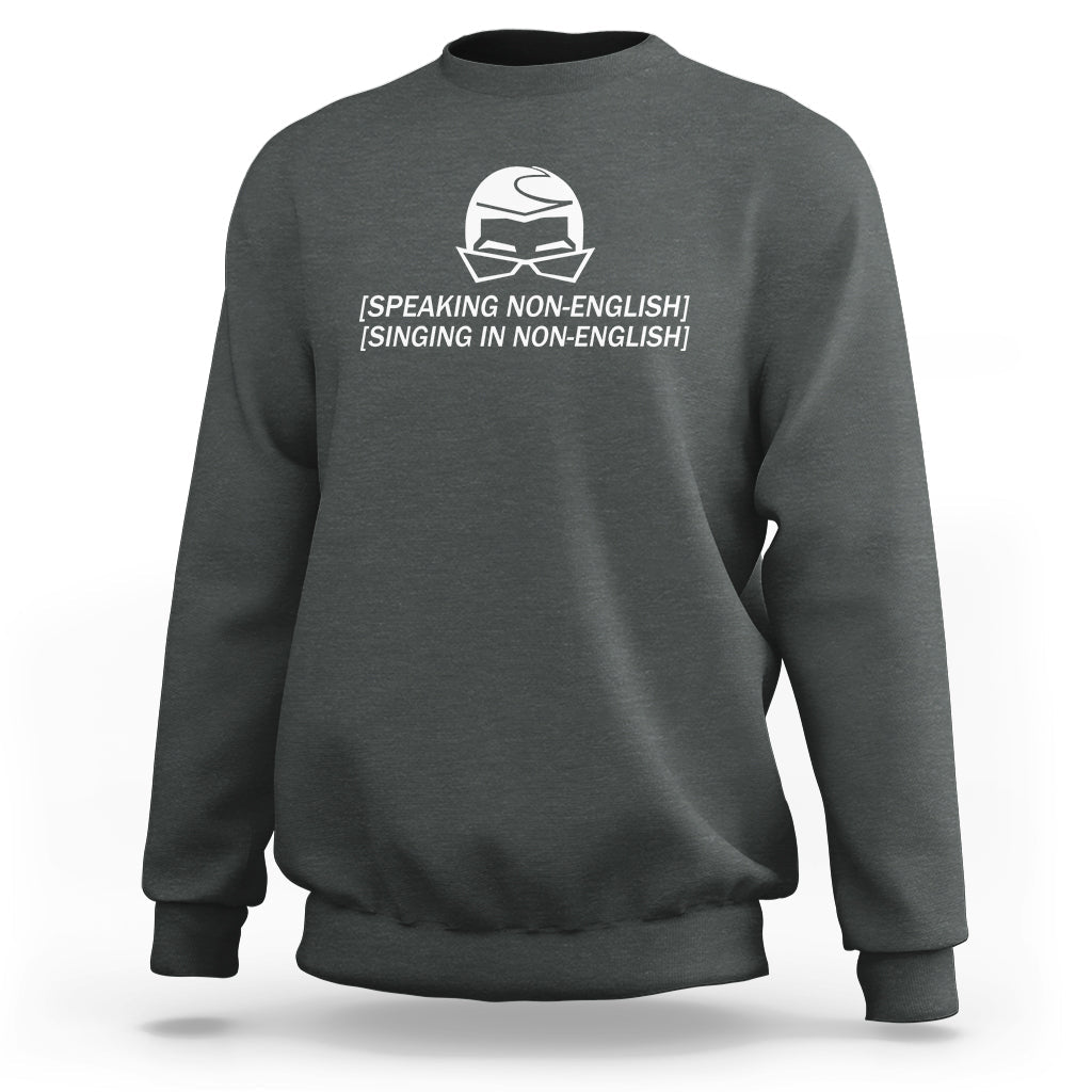 Dark gray crewneck sweatshirt with white helmet graphic and speaking/singing text on chest