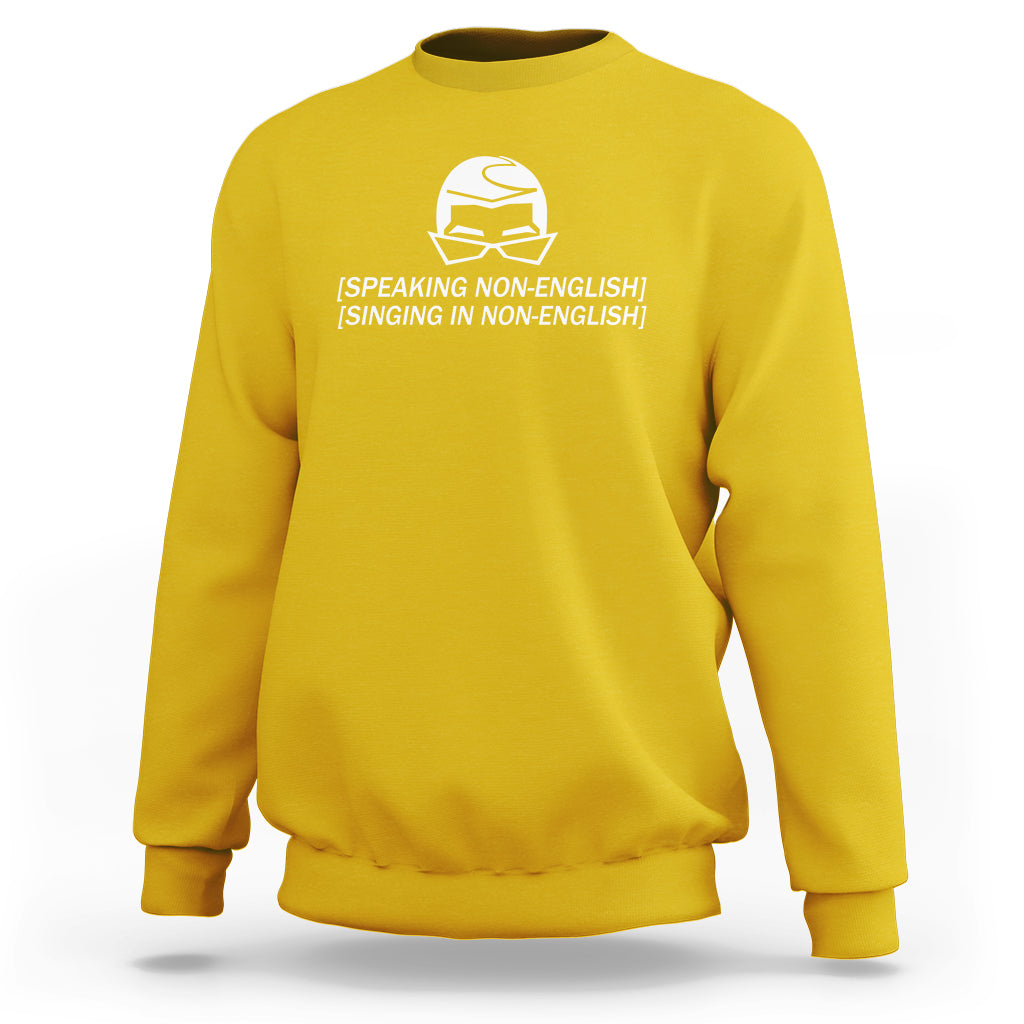 Yellow crewneck sweatshirt with white helmet graphic and speaking/singing text on chest