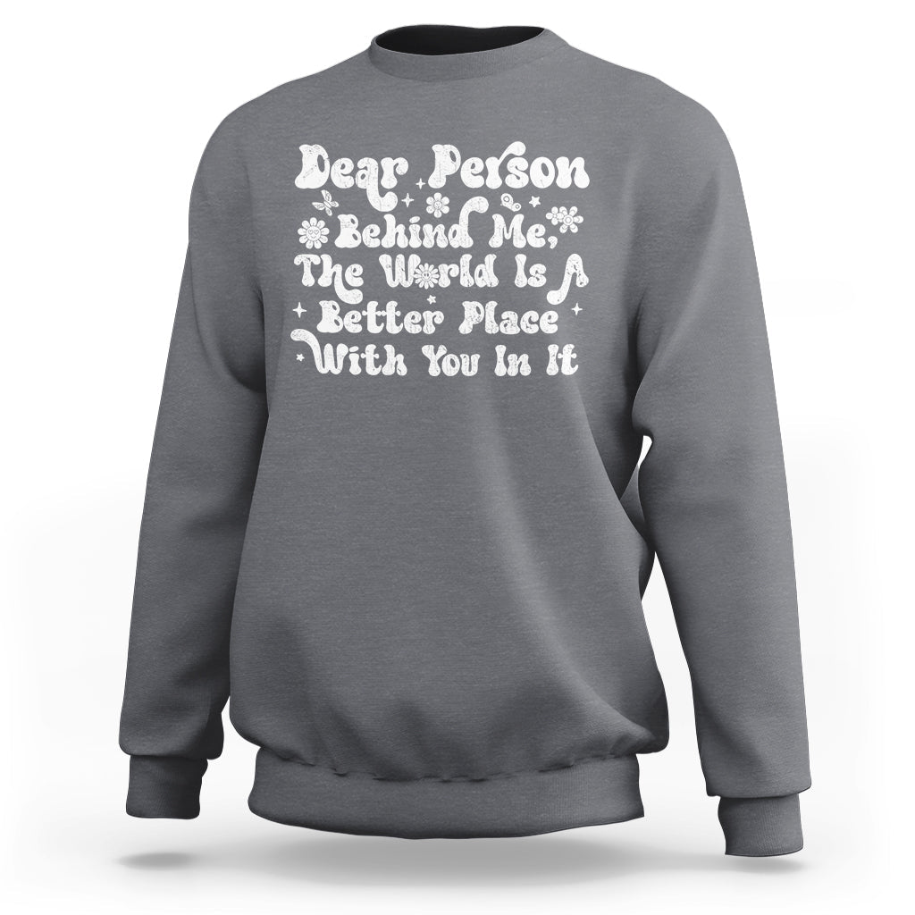 Charcoal gray sweatshirt with front graphic text and hearts, crew neck long sleeves