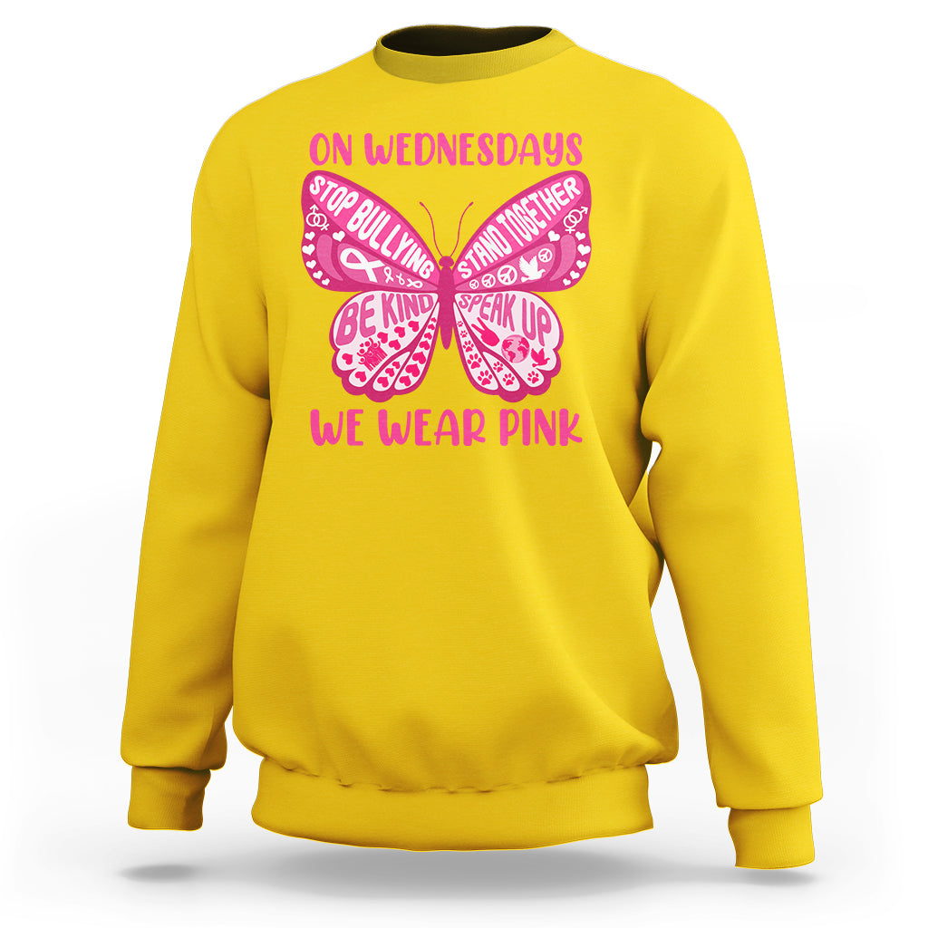 Daisy yellow crewneck sweatshirt with pink butterfly anti-bullying graphic and slogan