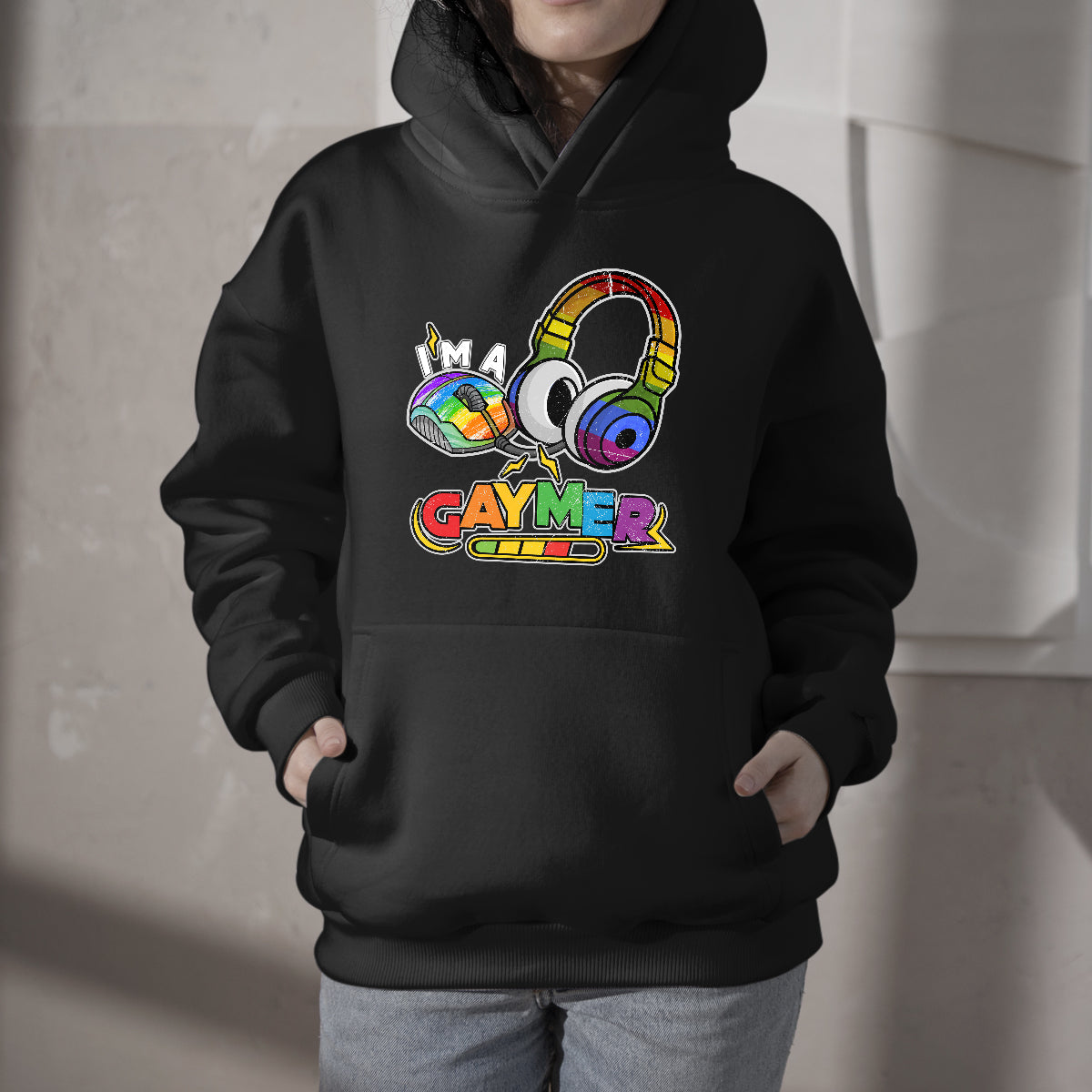 Black youth hoodie with rainbow headphones graphic, front pocket, drawstring hood