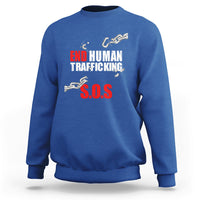 Royal blue crewneck sweatshirt with 'END HUMAN TRAFFICKING' and red 'S.O.S.' front graphic