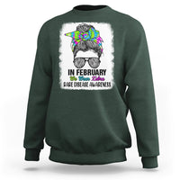 Forest green crewneck sweatshirt with zebra messy-bun graphic and 'Rare Disease Awareness'