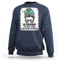 Navy crewneck sweatshirt with zebra messy-bun graphic and 'Rare Disease Awareness'