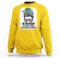 Daisy yellow crewneck sweatshirt with zebra messy-bun graphic and 'Rare Disease Awareness'