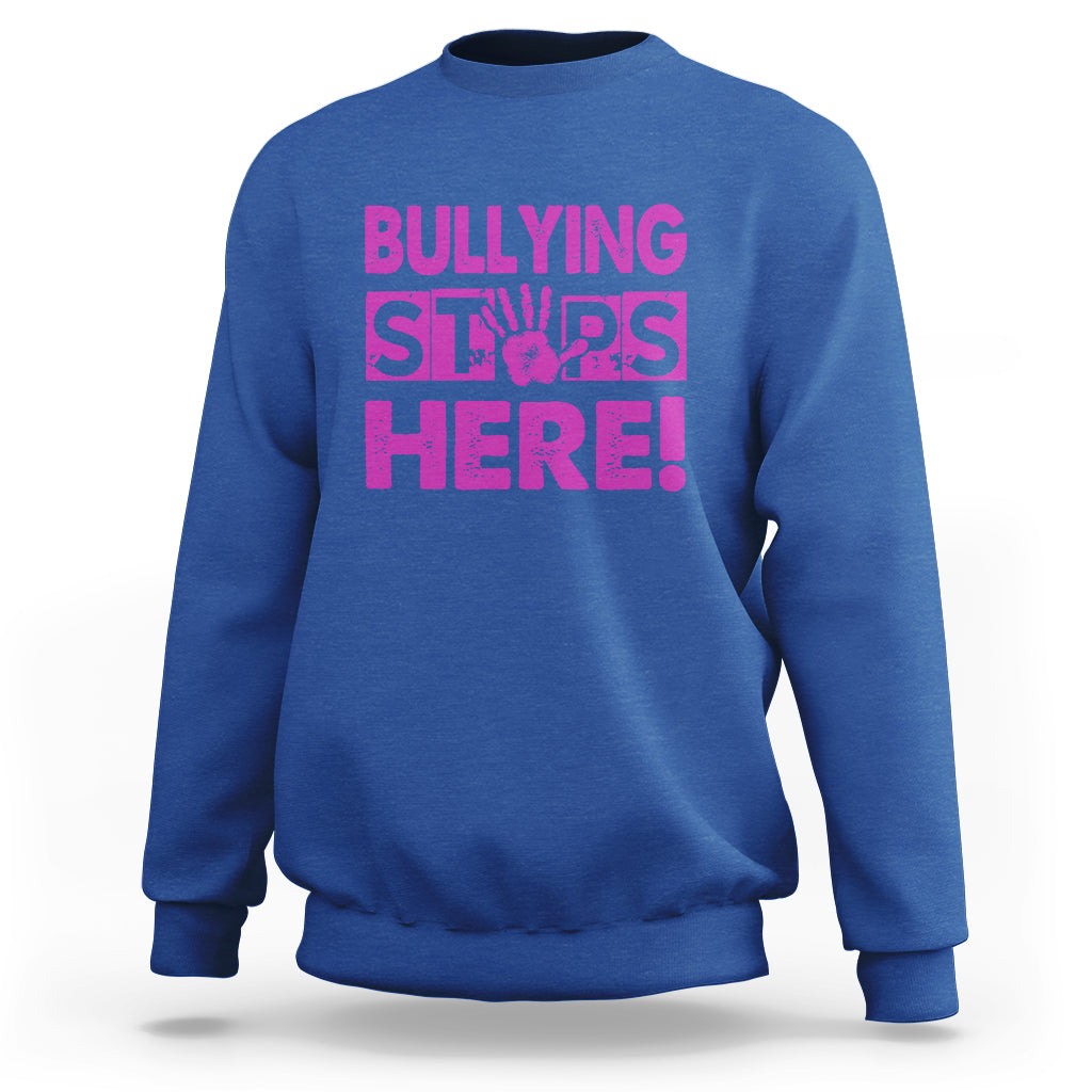 Royal blue crewneck sweatshirt with “BULLYING STARS HERE!” pink text graphic
