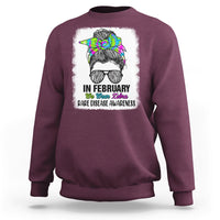 Maroon crewneck sweatshirt with zebra messy-bun graphic and 'Rare Disease Awareness'