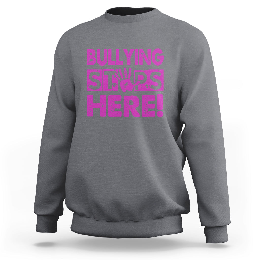 Charcoal gray crewneck sweatshirt with “BULLYING STARS HERE!” pink text graphic
