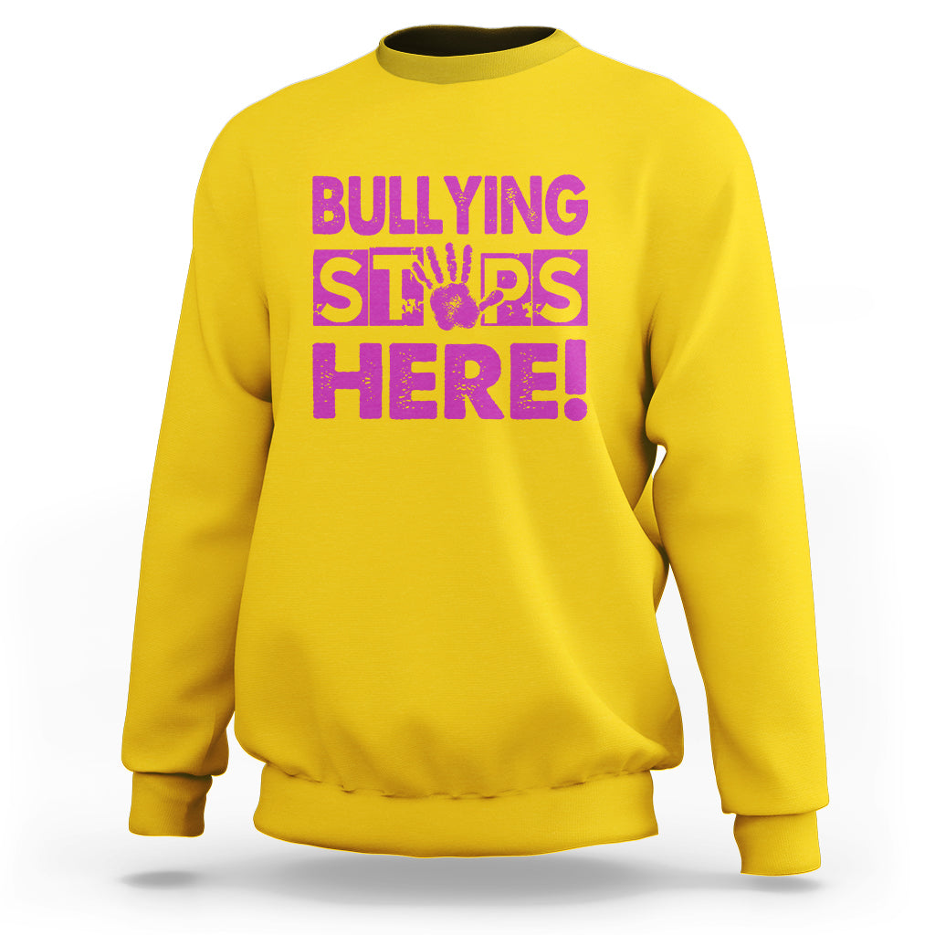 Daisy yellow crewneck sweatshirt with “BULLYING STARS HERE!” pink text graphic