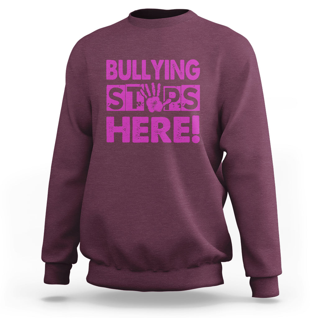 Maroon crewneck sweatshirt with “BULLYING STARS HERE!” pink text graphic