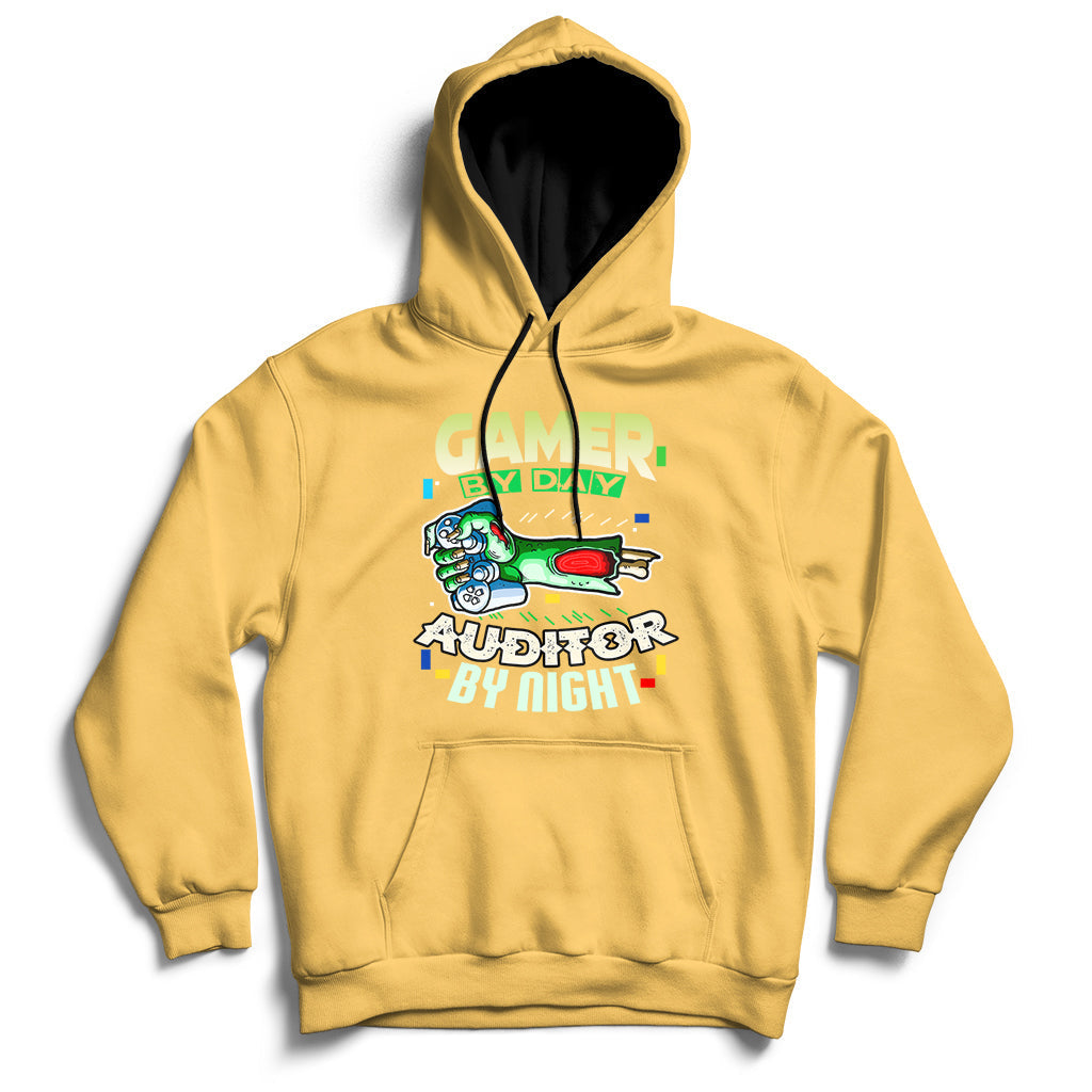 Yellow hoodie with front kangaroo pocket and “GAMER / AUDITOR BY NIGHT” graphic.
