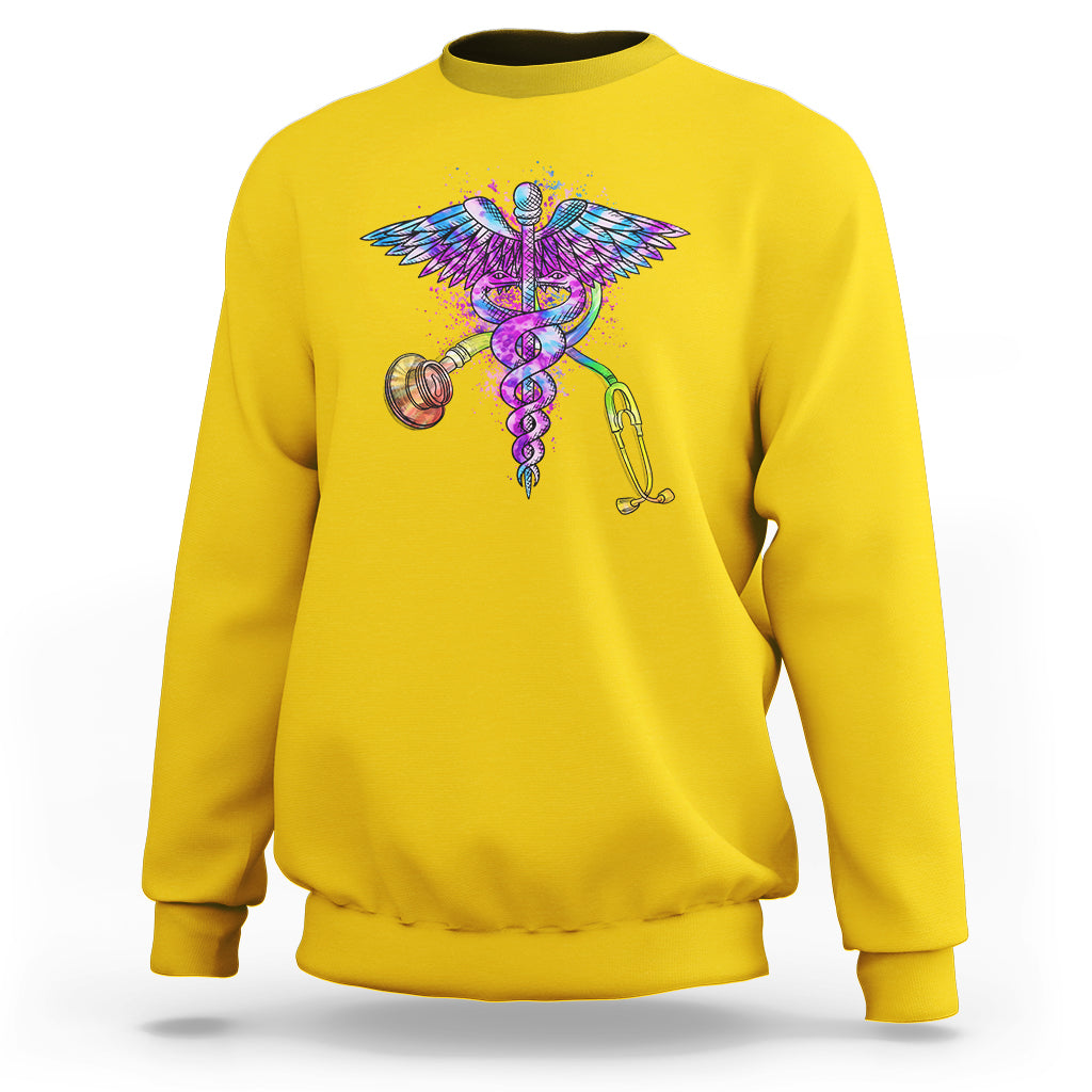 Daisy yellow crewneck sweatshirt with colorful stethoscope and wings graphic.