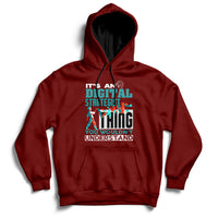 Maroon hoodie with front graphic text, pullover hood, and kangaroo pocket