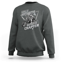 Heather gray crewneck sweatshirt with biker skeleton graphic and bold text print