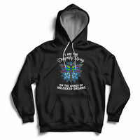 Black pullover hoodie with dragonfly graphic and “On the wings of unlocked dreams” text