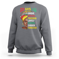 Light gray crewneck sweatshirt with front graphic portrait and text 'GOD SAYS I AM'