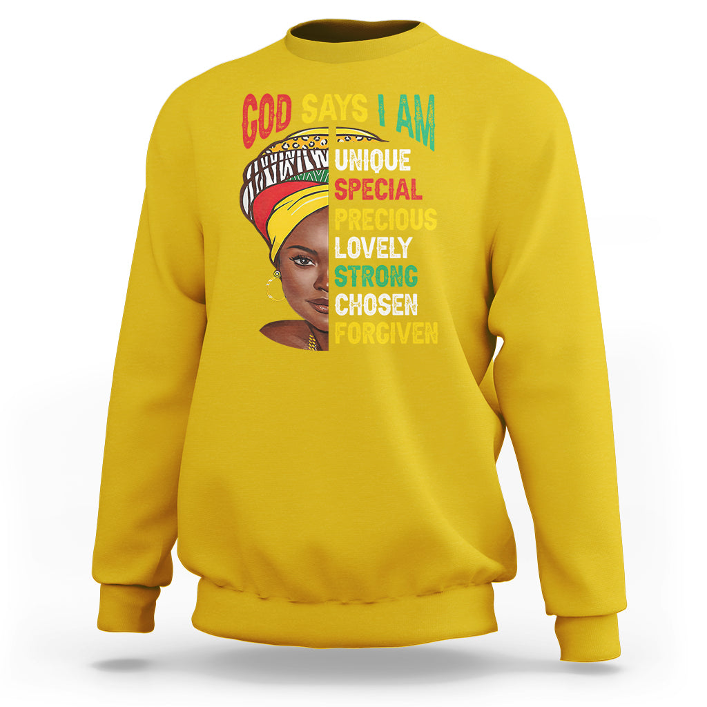 Yellow crewneck sweatshirt with front graphic portrait and text 'GOD SAYS I AM'