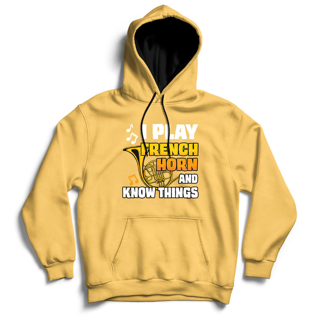 Yellow pullover hoodie with front pocket and French horn quote graphic.