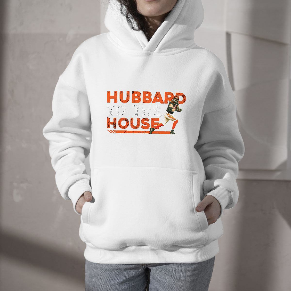 White fan hoodie with kangaroo pocket and 'HUBBARD TO THE HOUSE' front graphic