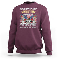 Maroon crewneck sweatshirt with patriotic eagle graphic and offensive text print