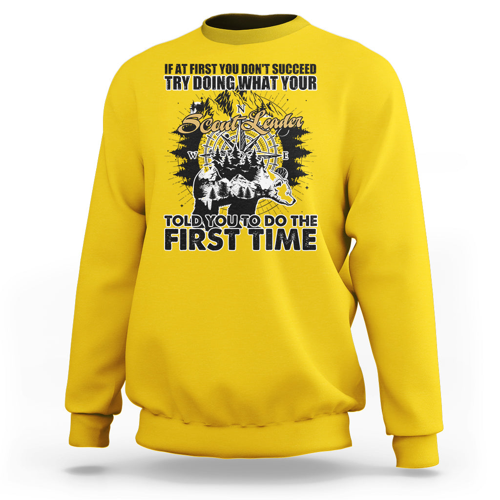 Daisy yellow crewneck sweatshirt with back graphic print and compass-style design.