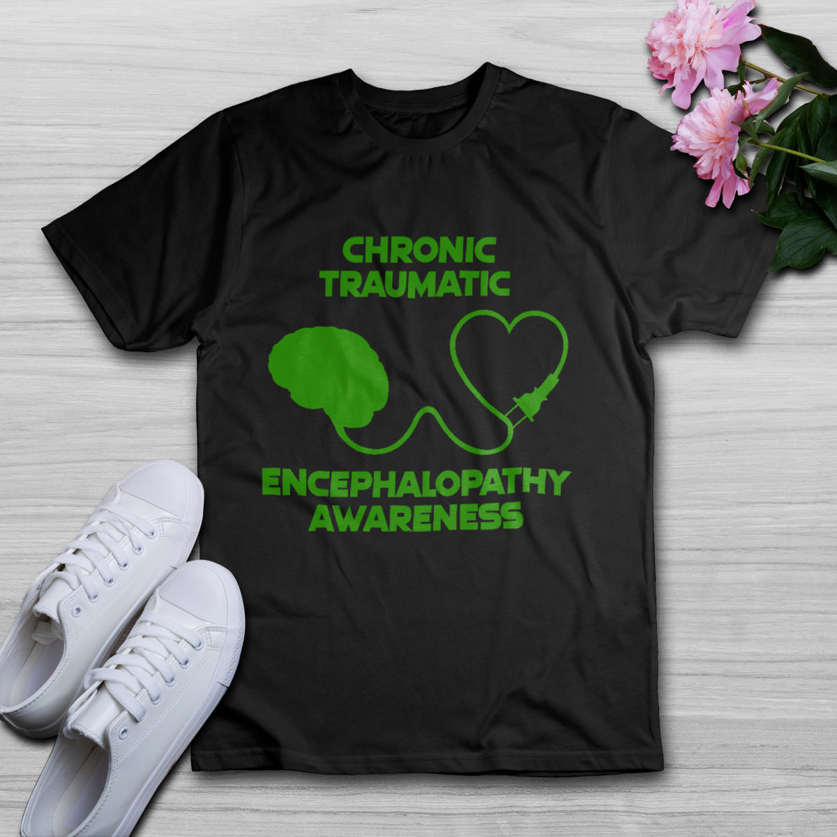 Black crew-neck T-shirt, green CTE awareness graphic on front, flat lay view