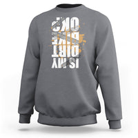 Light gray crewneck sweatshirt with distressed front graphic print, long sleeves and ribbed cuffs