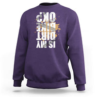 Purple crewneck sweatshirt with distressed front graphic print, long sleeves and ribbed cuffs