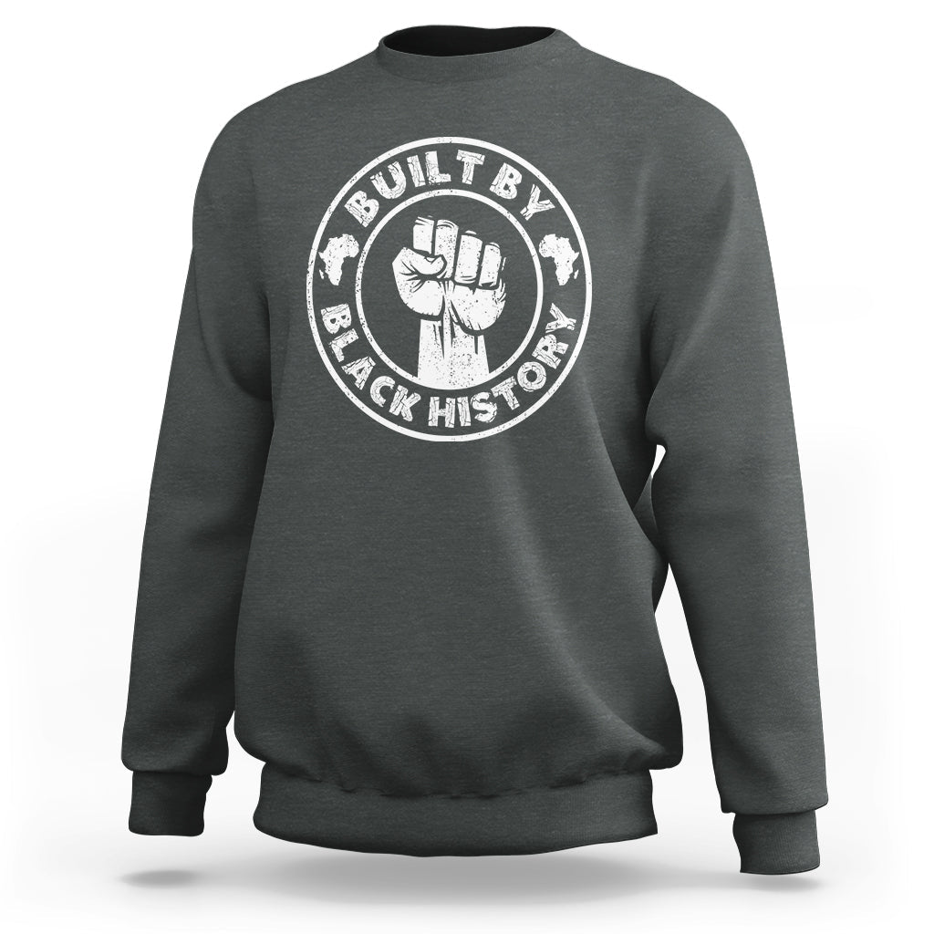 Dark heather gray crewneck sweatshirt with round “Built by Black History” graphic badge