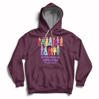 Maroon pullover hoodie with front colorful 'Embrace Equity' and 'International Women's Day' graphic.