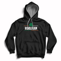 Black hoodie with hood, white drawstrings, HOOLIGAN clover chest graphic, front kangaroo pocket