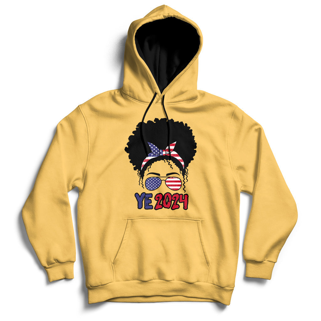 Yellow hoodie with front pocket, drawstring hood, and “YE 2024” messy-bun graphic