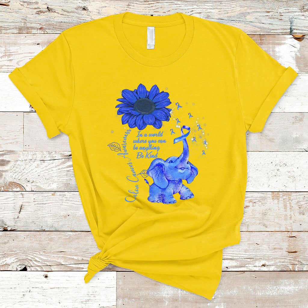 Daisy yellow T-shirt with blue elephant graphic, sunflower, and ribbon awareness design