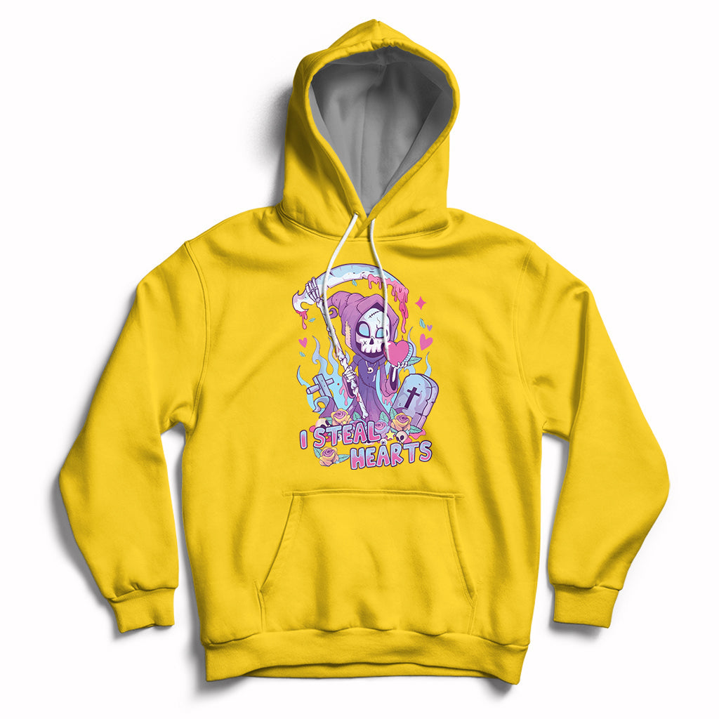 Yellow graphic hoodie with skull and heart design, pullover hood, and front kangaroo pocket